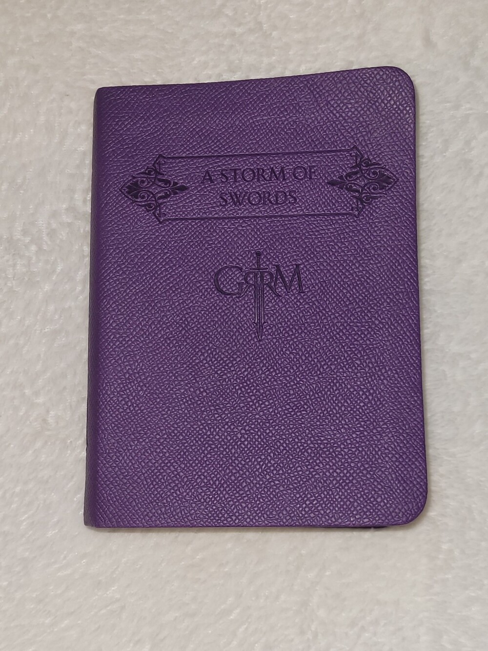 A Storm of Swords Purple Leather-bound Mini Book,  GRRM